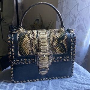 Unique Brahmin olive green, black , brown, tan studded embossed leather.